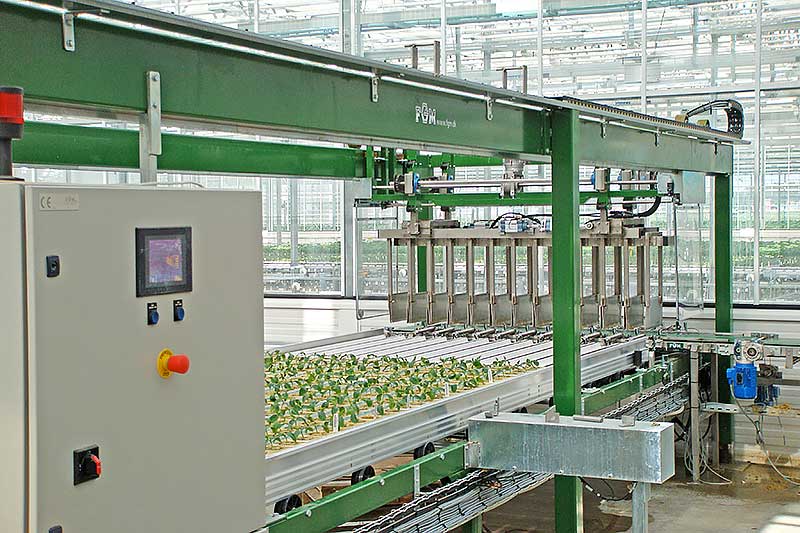 Robots for mobile tables place potted plants on the narrow part of the table