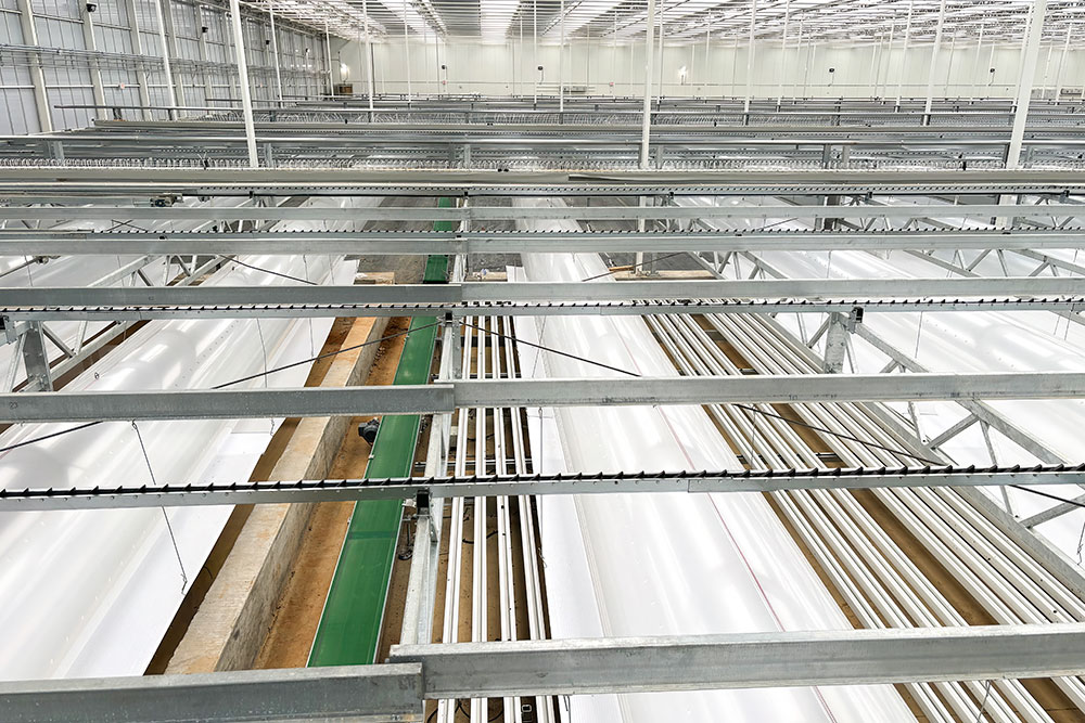Greenhouse gutter return line